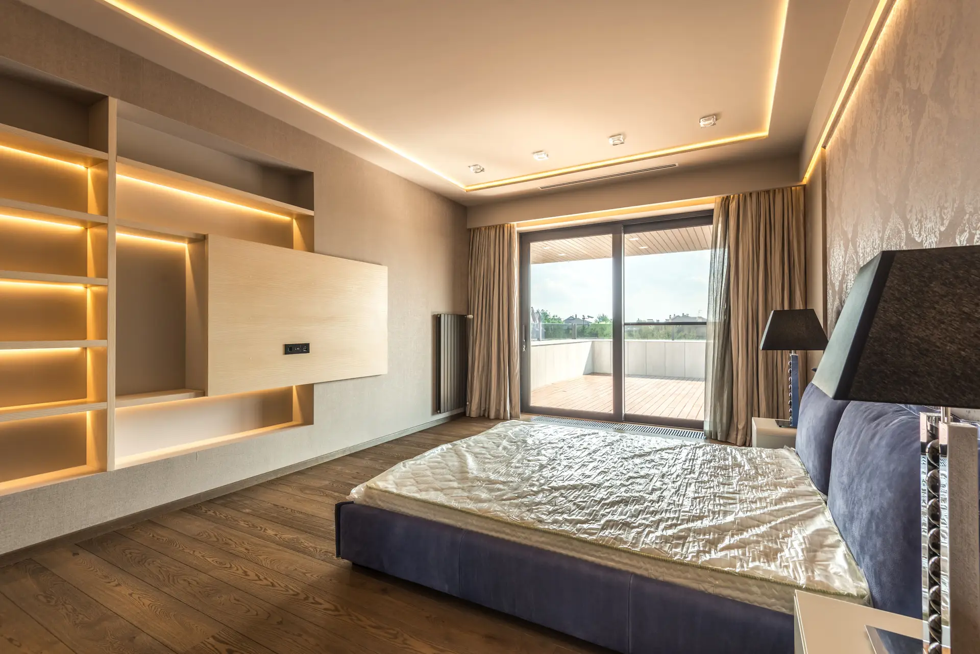 Luxurious modern bedroom with a view of the Ottawa skyline